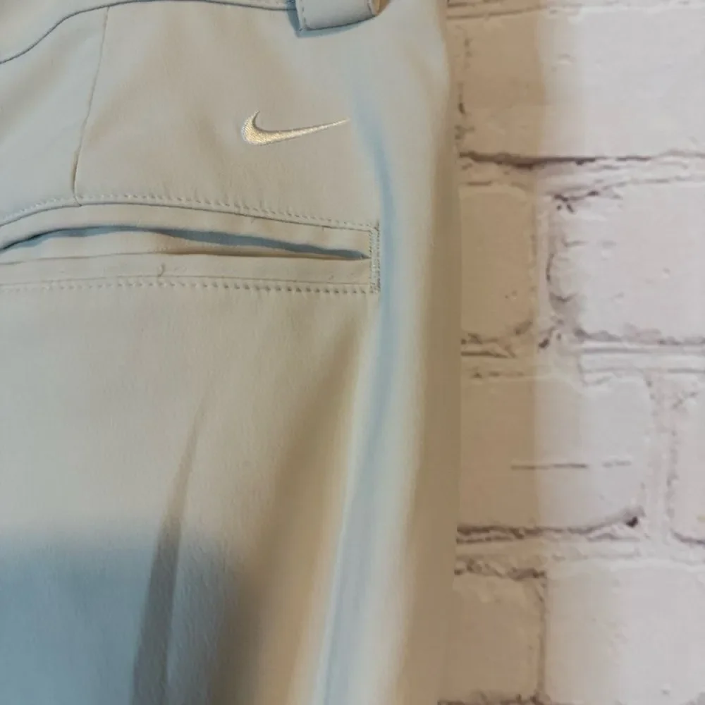 Nike Tour Performance Cream Chinos size 6